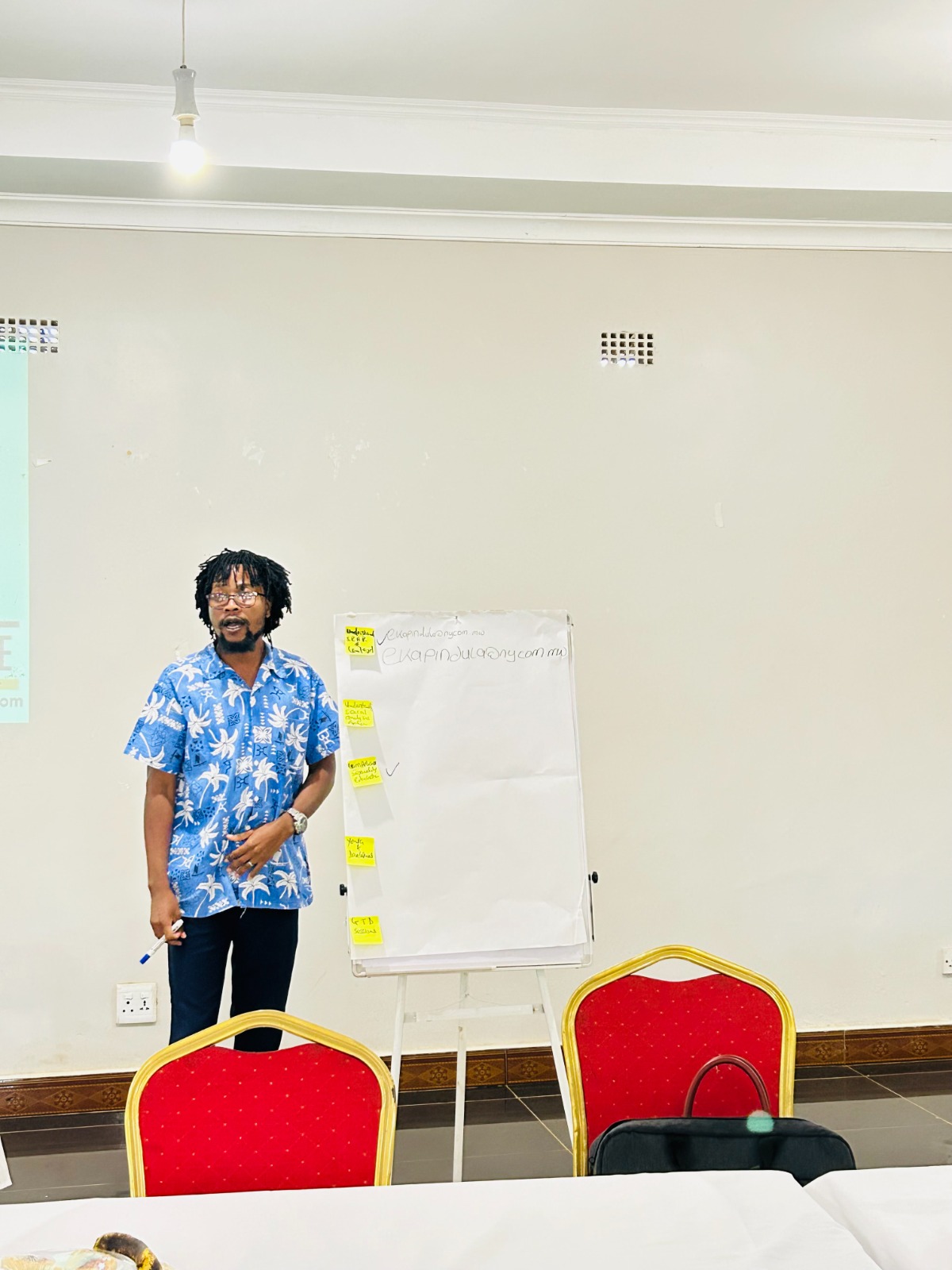 Community workshop with participants discussing health initiatives